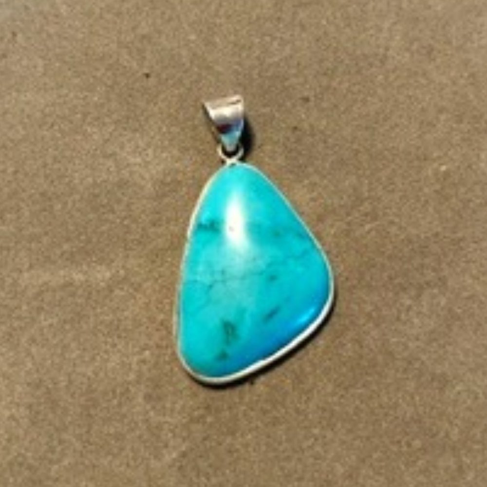 Southwestern Turquoise Soft Asymmetrical Pendant set in 925 silver with loop